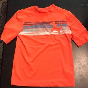 Orange rash guard